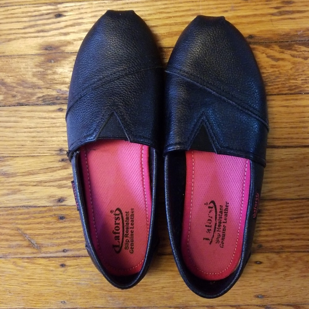 Black leather slip ons